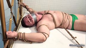 Peter bound and gagged in speedo