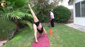 Riley Rose  doing Yoga in the yard when the landscapers help is needed for deep stretches