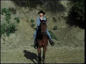 Young beautiful blonde was riding the horse when she has  met handsome cowboy