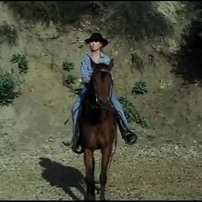 Young beautiful blonde was riding the horse when she has  met handsome cowboy