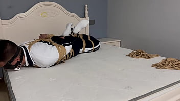 Asian student in white socks, tightly hogtied and gagged