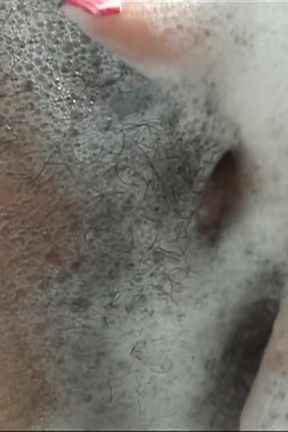 Caressing her sexy body in a bath