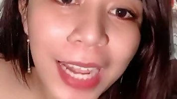 Chubby amateur teen with big boobs is posing and teasing in front of the camera