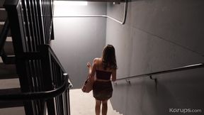Smoking hot babe gets caught masturbating in the hotel staircase