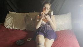 Beautiful Woman Smokes a Cigarette in Revealing Dress