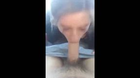 Pierced Brunette Blows in the Car