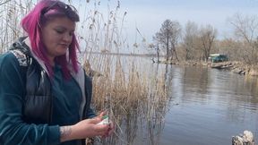 blow balloon with cigarette on river