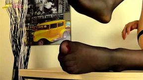 Denny Leon in black stockings shows her dick and feet!