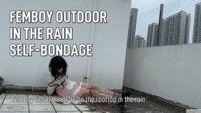 Femboy ties himself up on the rooftop in the rain