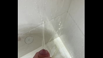 Pissing &amp_ Jerking Off At The Same Time