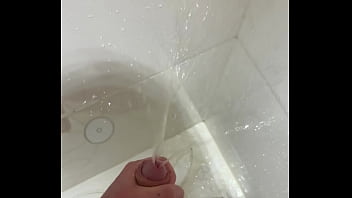 Pissing &amp_ Jerking Off At The Same Time