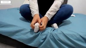 Gigi-g itches dry feet out her dirty white socks