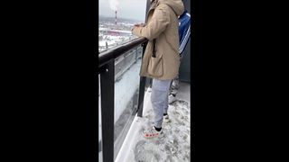 A friend discreetly gave a suck on a shared balcony