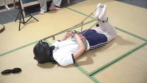 My girlfriend tested the metal restraint device; it was like a pig's leash, with even her toes tightly bound.