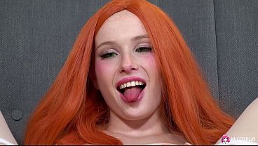Horny slutty redhead Arielka fingers her shaved pussy and enjoys it with a sex toy.