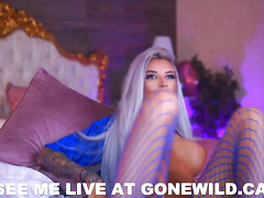 Stunning Platinum Blonde Bombshell Teases Huge Tits on Cam