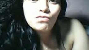 Gorgeous Filipina girl flashing her titties on webcam