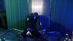 Rubberboy with gas mask pisses and cums