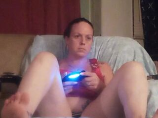 Gorgeous hotty smokin' cigarette and playing movie scene games, during the time that I film up her mini suit