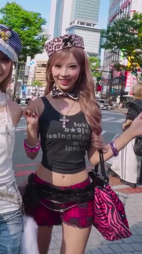 Japanese cosplay girl in city street