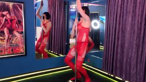 She Dances in a Red Bodysuit, as if Someone Is Going to Take Her Right at the Pylon