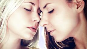 ”Henessy A & Lola A finger each other on the bed”