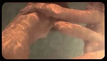 Seductive Poolside Lesbians Exploring and Stripping