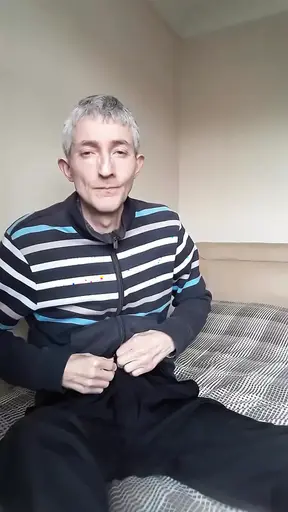 Masturbating in Tracksuit Top.