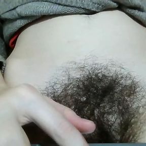 Hairy pussy aside, girl is showing her hair to her boyfriend to impress him.