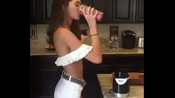 Hot model makes an early smoothie