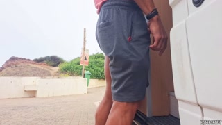 Exhibitionist couple masturbates in public places - she jerks off a big cock and touches her pussy