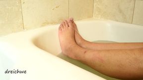Feet in hot water in a jacuzzi