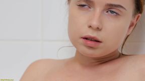 Teen Masturbates Using the Shower Jet