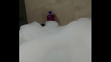Male cosplayer enjoys a relaxing bubble bath solo