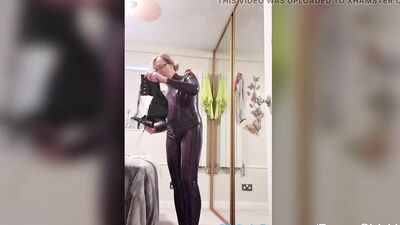 Essex Girl Lisa dressing up in my latex catsuit