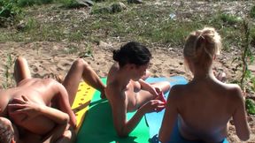 Four Tanned Stepsisters Lick Their Pussies in the Sun on the Beach