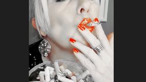 Smoker Mummy do chain smoke with deep powerful inhalations with lots of white smoke close up, in focus the red shiny lips and fingernails