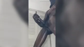 Muscular Guy Oils Up and Strokes Big Black Cock to Cumshot