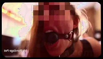 Sensual Hogtie Torment: Gagged Brunette Petgirl in Metal Bondage