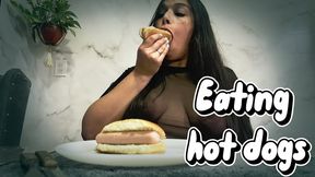 Eating hot dogs