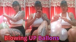BLOWING UP BALLOONS