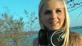 Cute blond babe is sucking dick in the open air