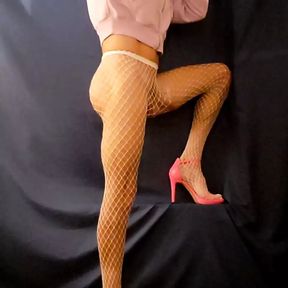 Sexy Sandy poses and strokes her clit in white mesh pantyhose