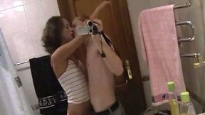 Horny dude films amateur brunette girl in the bathroom