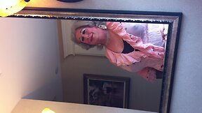 Crossdresser in front of the mirror