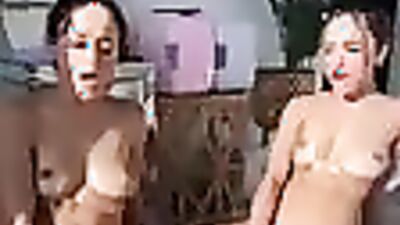 Watch these oiled-up twins get wild outdoors