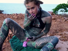 Anuskatzz fucks her ass in public with a big toy