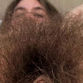 Hairy pussy babe Brooke strips down to show off her amazing fur