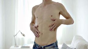 A hot athletic twink tease and tug on a huge cock while flaunting his ink