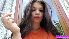 Early smoking outside in front of the house